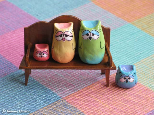 Paper-mache owls family